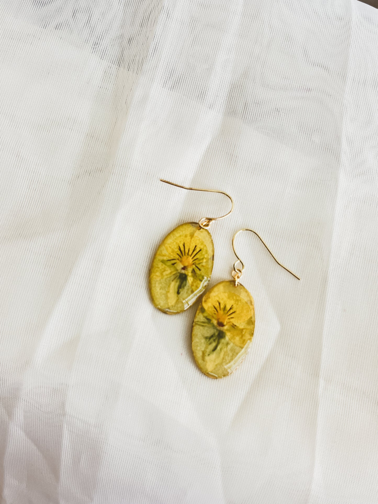 YELLOW PANSY in GOLD OVAL DANGLE