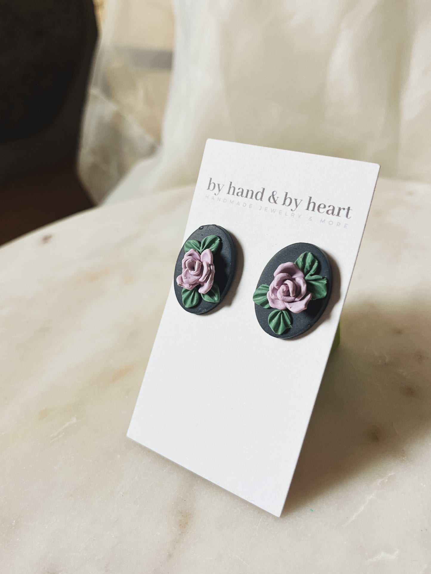 NAVY FLORAL STUDS