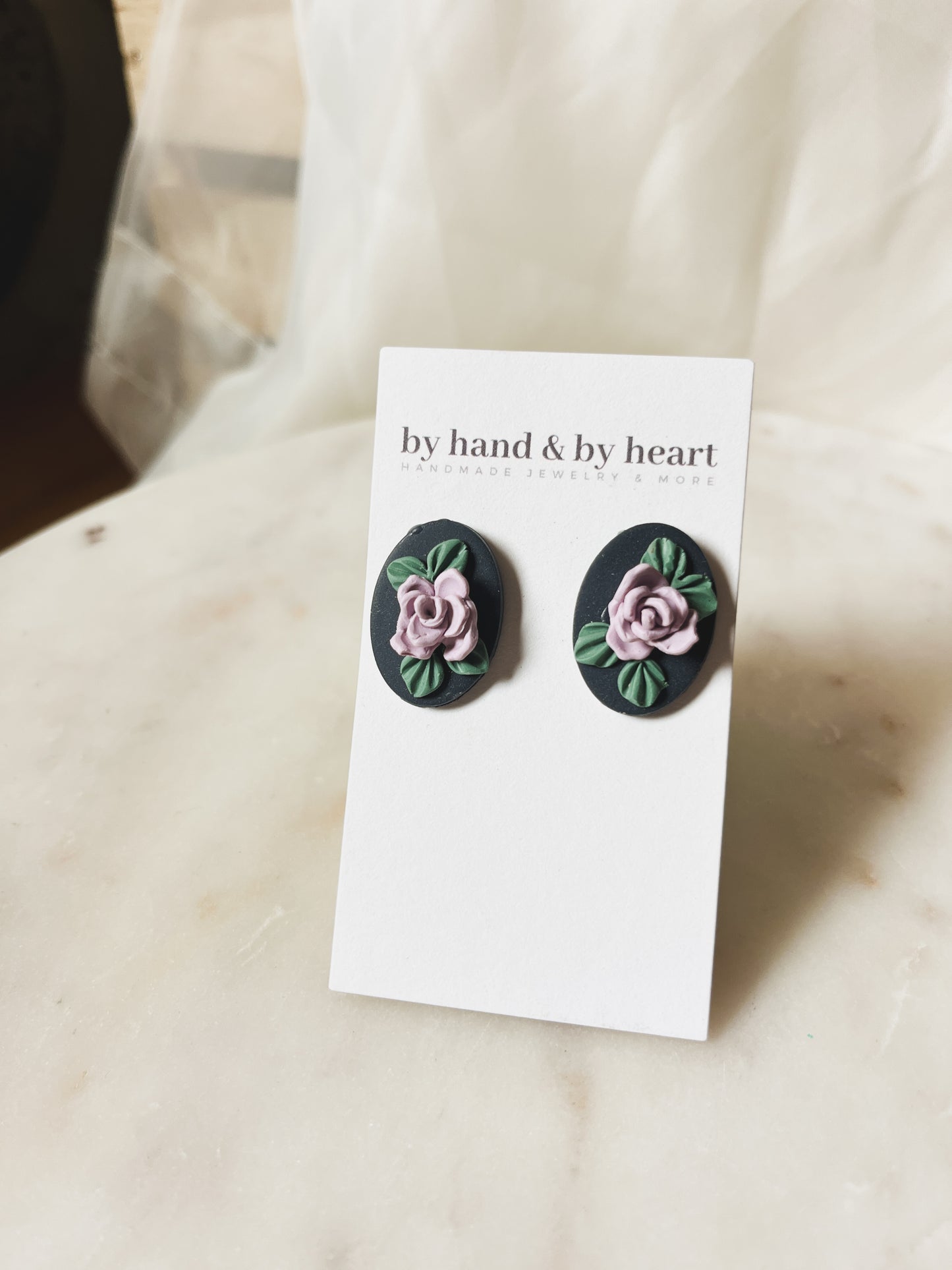 NAVY FLORAL STUDS