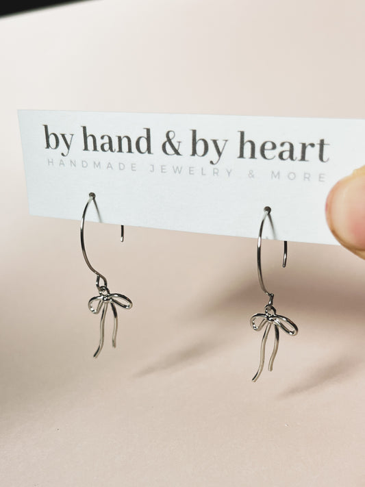 SILVER TINY BOW HOOPS