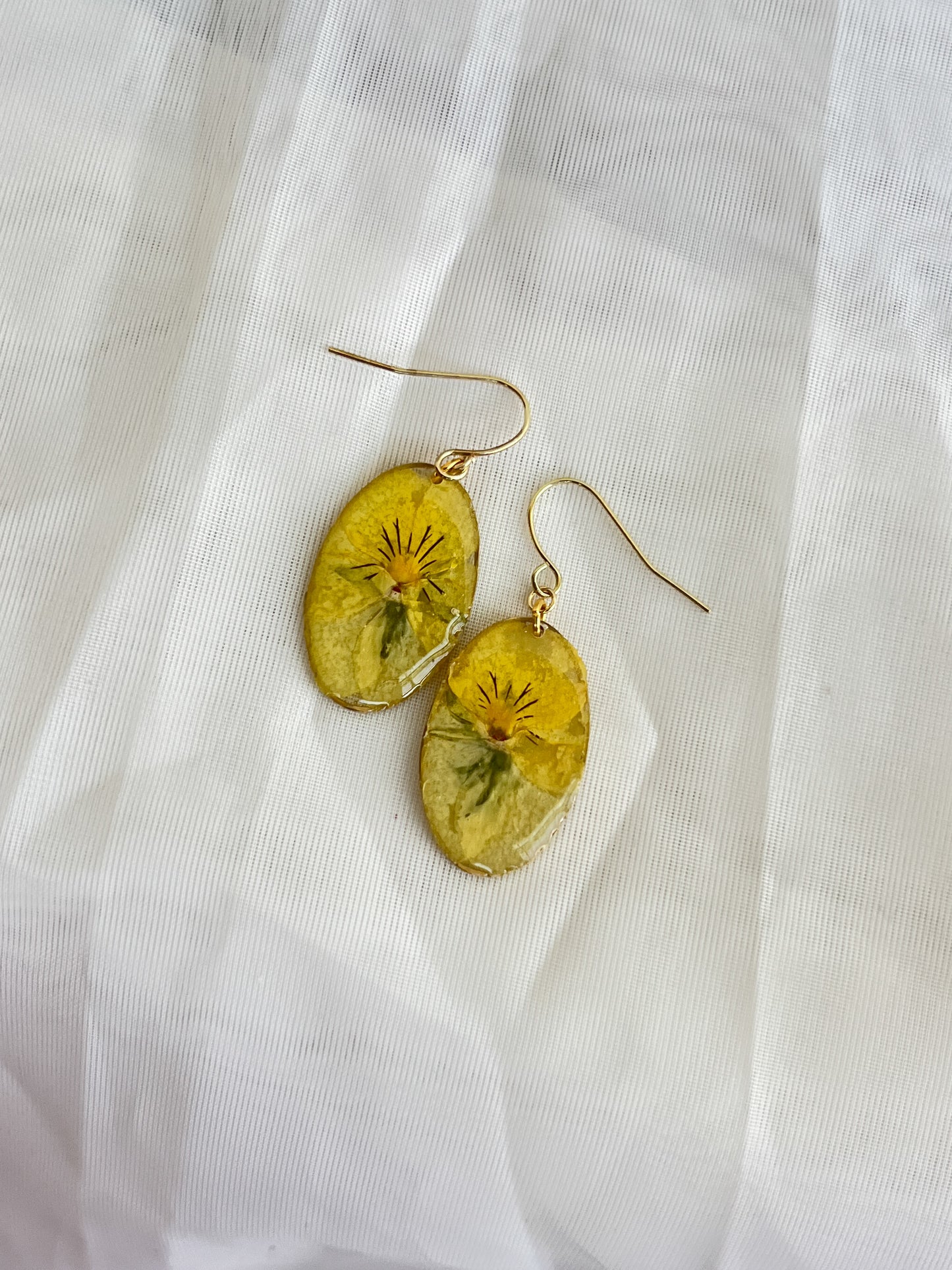 YELLOW PANSY in GOLD OVAL DANGLE