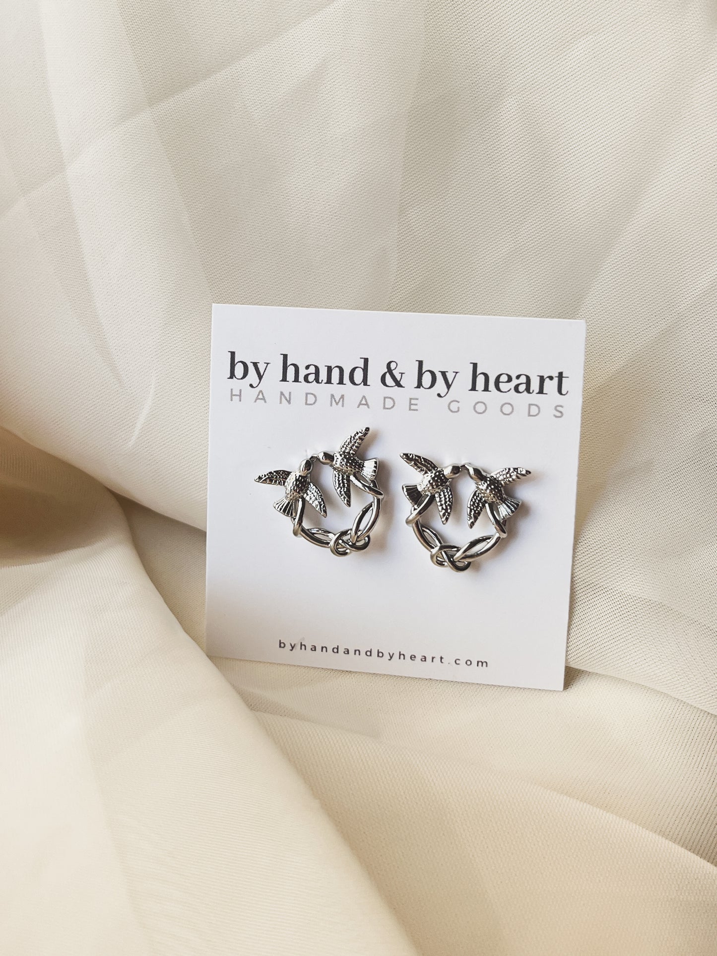 SILVER SWALLOW STUDS