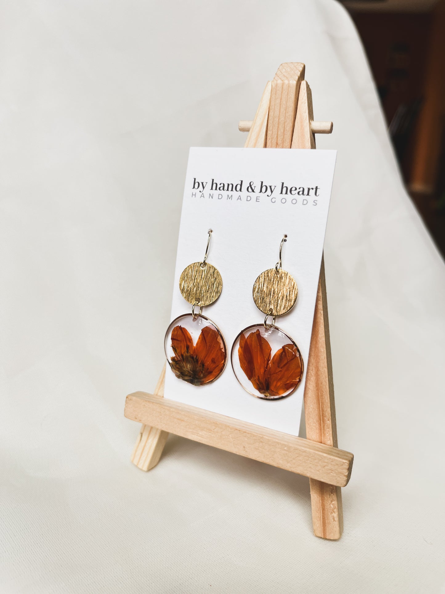 ORANGE AND GOLD FLORAL RESIN DANGLE