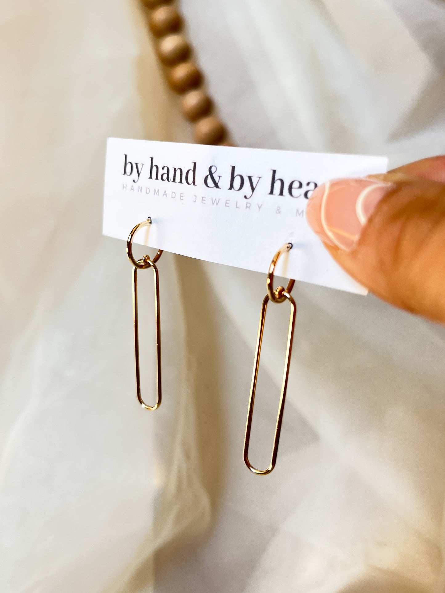 GOLD LOVE OVAL DANGLES