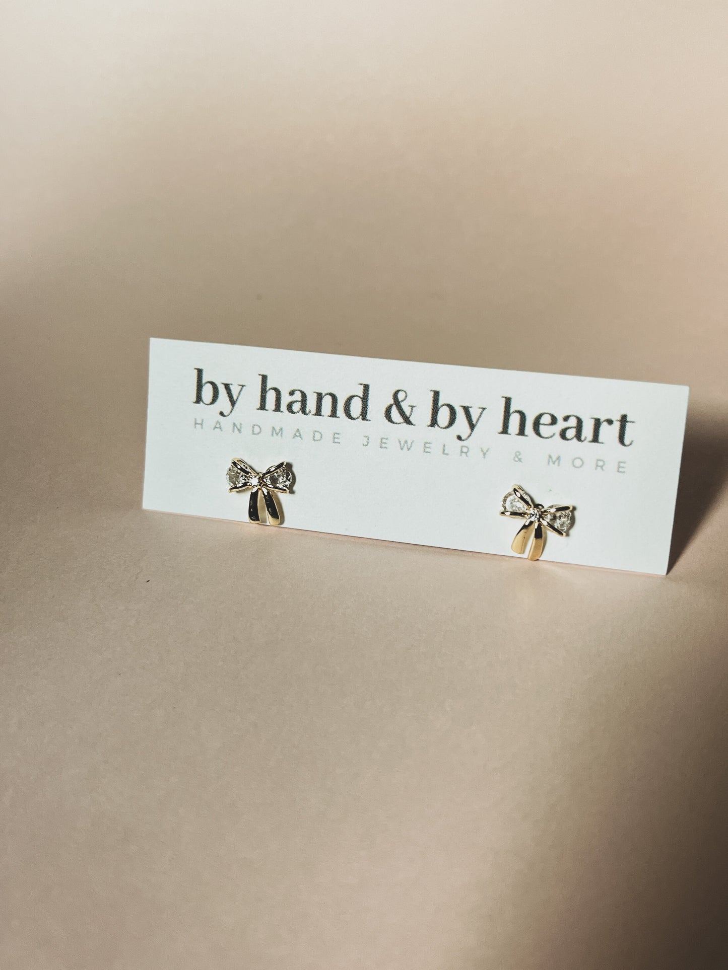 GEM BOW STUDS in Gold and Silver