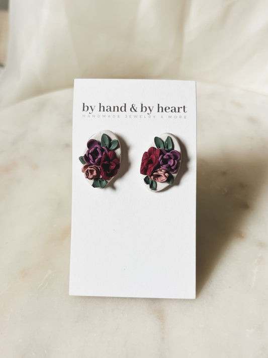 CREAM FLORAL STUDS