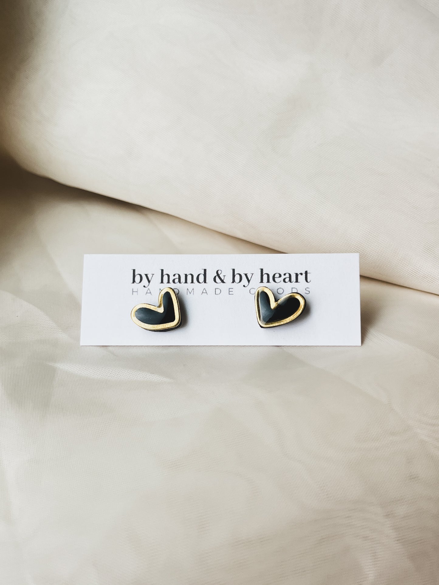 BLACK + GOLD HEART STUDS